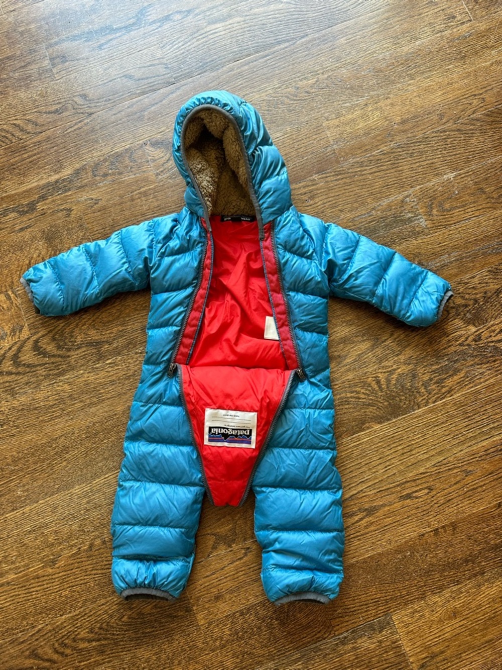 Adorable Patagonia Blue Infant Bunting with Red Interior and Brown Fleece Trim